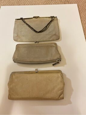 3 hobo international clutches in bone color